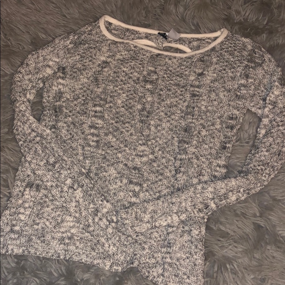 Sweater, heart shaped cut out in the back.